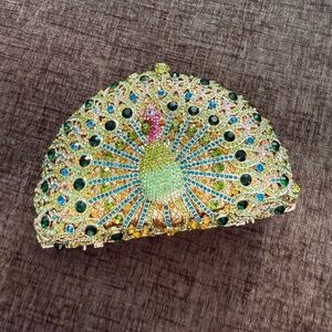 Luxory peacock clutch bag